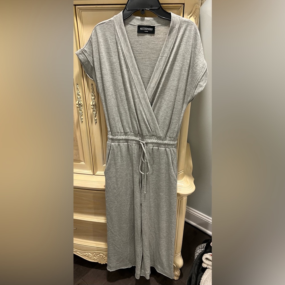 Brand-new, never worn. Soft adorable jumpsuit.